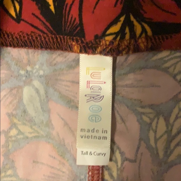 Lularoe poinsettia leggings - Picture 2 of 3